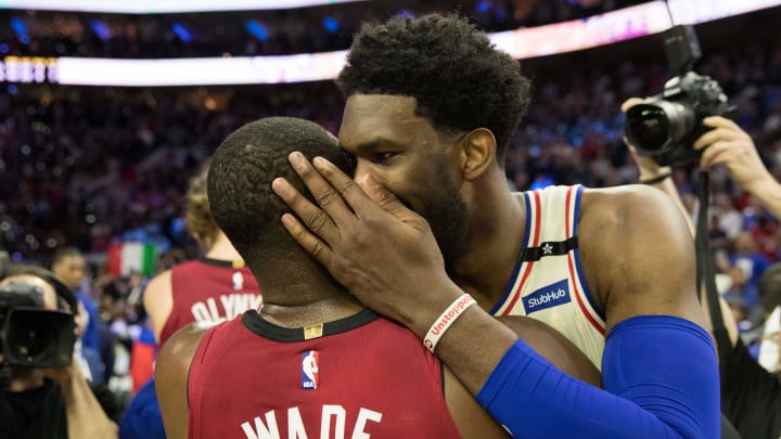 Apr 24, 2018; Philadelphia, PA, USA; Philadelphia 76ers center Joel Embiid (21) and Miami Heat guard Dwyane Wade (3) meet after game five of the first round of the 2018 NBA Playoffs at Wells Fargo Center. Mandatory Credit: Bill Streicher-USA TODAY Sports