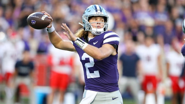 Sep 13, 2024; Manhattan, Kansas, USA; Kansas State Wildcats quarterback Avery Johnson (2) drops back to pass during the first quarter against the Arizona Wildcats at Bill Snyder Family Football Stadium. Mandatory Credit: Scott Sewell-Imagn Images