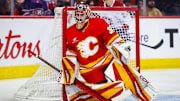 Mar 8, 2025; Calgary, Alberta, CAN; Calgary Flames goaltender Dustin Wolf (32) guards his net against the Montreal Canadiens during the first period at Scotiabank Saddledome. Mandatory Credit: Sergei Belski-Imagn Images