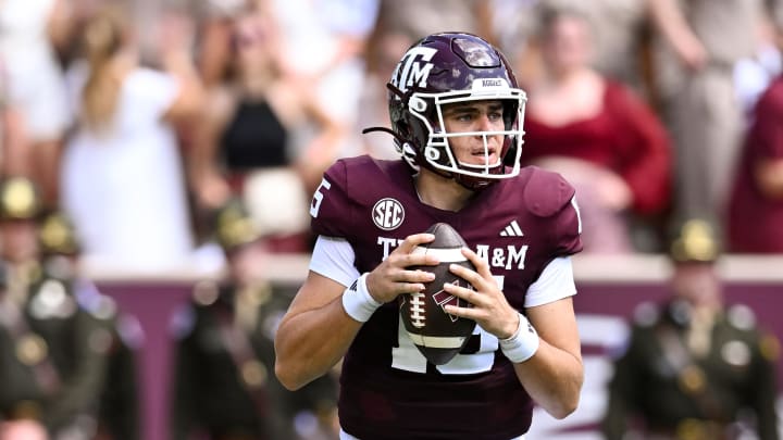 Sep 23, 2023; College Station, Texas, USA; Texas A&M Aggies quarterback Conner Weigman (15) in action during the second quarter against the Auburn Tigers at Kyle Field. Mandatory Credit: Maria Lysaker-USA TODAY Sports