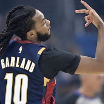 Nov 5, 2025; Cleveland, Ohio, USA; Cleveland Cavaliers guard Darius Garland (10) celebrates his three-point basket in the first quarter against the Philadelphia 76ers at Rocket Arena. Mandatory Credit: David Richard-Imagn Images