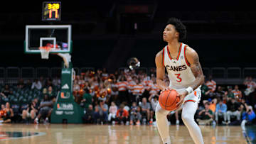 Dec 7, 2024; Coral Gables, Florida, USA; Miami Hurricanes guard Jalil Bethea (3) shoots the basketball against the Clemson Tigers during the second half at Watsco Center. Mandatory Credit: Sam Navarro-Imagn Images
