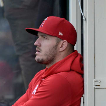 May 9, 2024; Anaheim, California, USA;  Los Angeles Angels center fielder Mike Trout (27) looks on from the dugout during the game against the Kansas City Royals at Angel Stadium. Mandatory Credit: Jayne Kamin-Oncea-USA TODAY Sports