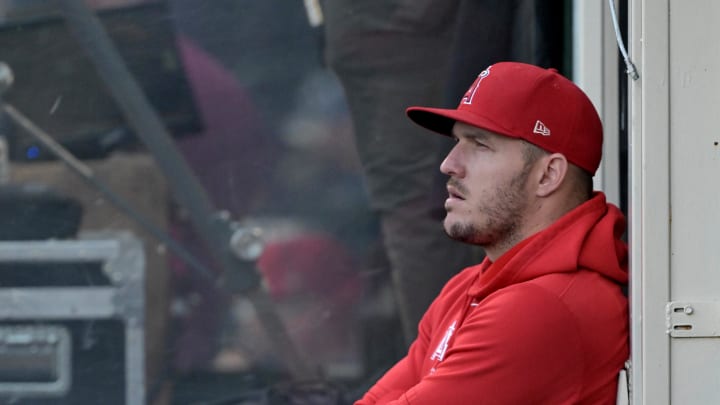 May 9, 2024; Anaheim, California, USA;  Los Angeles Angels center fielder Mike Trout (27) looks on from the dugout during the game against the Kansas City Royals at Angel Stadium. Mandatory Credit: Jayne Kamin-Oncea-USA TODAY Sports