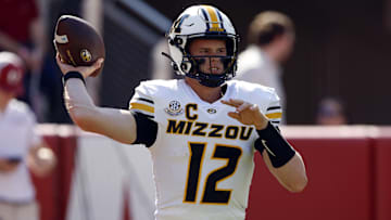 Oct 26, 2024; Tuscaloosa, Alabama, USA;  Missouri Tigers quarterback Brady Cook (12) warms up before a game against the Alabama Crimson Tide at Bryant-Denny Stadium. Mandatory Credit: Butch Dill-Imagn Images