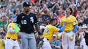 Boston Red Sox first baseman Triston Casas (36) celebrates his walk-off against the Chicago White Sox with catcher Carlos Narvaez (75)  at Fenway Park. 