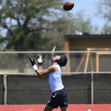 A Hale Center player catches a pass against Tulia in the Sudan 7-on-7 football state-qualifying tournament Friday, June 13, 2025, at Hornet Field in Sudan.