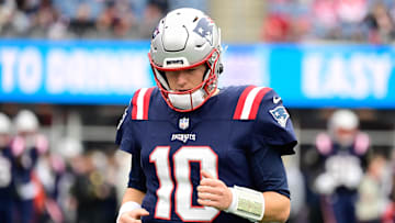 Dec 17, 2023; Foxborough, Massachusetts, USA; New England Patriots quarterback Mac Jones (10) warms