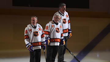 Oct 14, 2016; Los Angeles, CA, USA; Los Angeles Kings former players Dave Taylor (left), Marcel Dionne (center) and Charlie Simmer are introduced during a NHL game against the Philadelphia Flyers at Staples Center. Mandatory Credit: Kirby Lee-Imagn Images