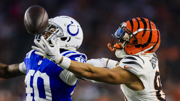 Aug 22, 2024; Cincinnati, Ohio, USA; Cincinnati Bengals wide receiver Jermaine Burton (81) attempts to catch a pass against Indianapolis Colts cornerback Jaylon Jones (40) in the first half at Paycor Stadium. 