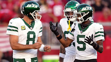 New York Jets QB Aaron Rodgers (8) and WR Garrett Wilson (5)