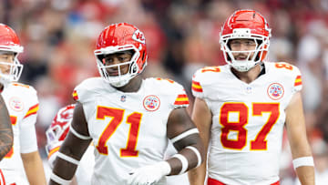 Aug 9, 2025; Glendale, Arizona, USA; Kansas City Chiefs offensive tackle Josh Simmons (71) and tight end Travis Kelce (87) against the Arizona Cardinals during a preseason NFL game at State Farm Stadium. Mandatory Credit: Mark J. Rebilas-Imagn Images