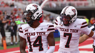 Sep 20, 2025; Salt Lake City, Utah, USA; Texas Tech Red Raiders defensive back Brice Pollock (14) and defensive back Brenden Jordan (7) react to a defensive stop against the Utah Utes during the third quarter at Rice-Eccles Stadium. Mandatory Credit: Rob Gray-Imagn Images
