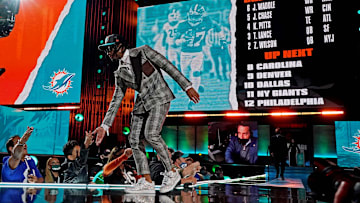 Jaylen Waddle (Alabama) walks on stage after being selected by Miami Dolphins as the number six overall pick in the first round of the 2021 NFL Draft at First Energy Stadium.