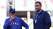 Sep 28, 2024; Anaheim, California, USA;  Texas Rangers pitching coach Mike Maddux (31) talks with general manager Chris Young (right) prior to a game against the Los Angeles Angels at Angel Stadium.