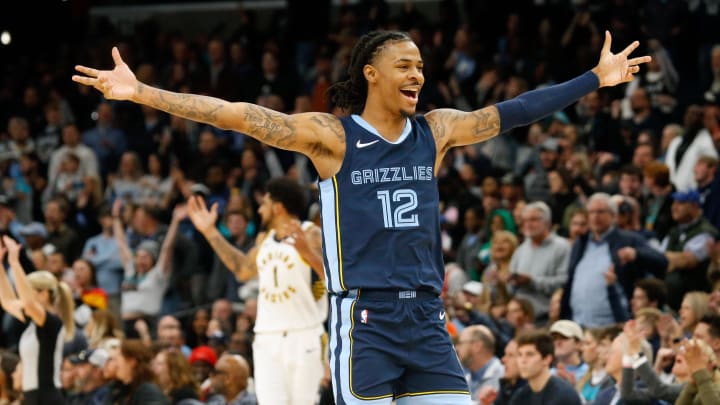 Dec 21, 2023; Memphis, Tennessee, USA; Memphis Grizzlies guard Ja Morant (12) reacts during the second half against the Indiana Pacers at FedExForum. 