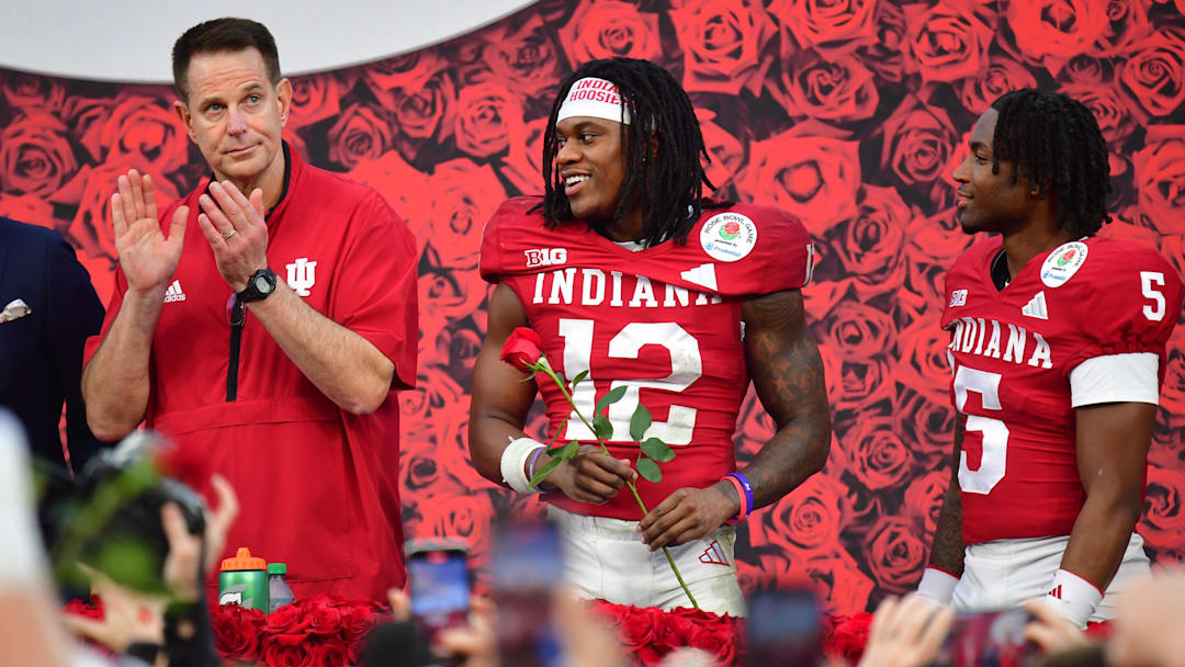 Jan 1, 2026; Pasadena, CA, USA; Indiana Hoosiers head coach Curt Cignetti and defensive back Devan Boykin (12) celebrate after defeating the Alabama Crimson Tide in the 2026 Rose Bowl and quarterfinal game of the College Football Playoff at Rose Bowl Stadium. Mandatory Credit: Gary A. Vasquez-Imagn Images