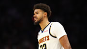 Nov 29, 2025; Phoenix, Arizona, USA; Denver Nuggets forward Cameron Johnson (23) against the Phoenix Suns at the Mortgage Matchup Center.