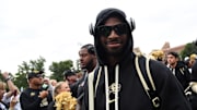 Sep 21, 2024; Boulder, Colorado, USA; Colorado Buffaloes quarterback Shedeur Sanders (2) walks through Buff Walk before the game against the Baylor Bears at Folsom Field. Mandatory Credit: Christopher Hanewinckel-Imagn Images