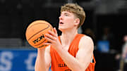 Mar 20, 2025; Milwaukee, WI, USA; Illinois Fighting Illini guard Kasparas Jakucionis (32) shoots the ball during NCAA Tournament First Round Practice at Fiserv Forum. Mandatory Credit: Benny Sieu-Imagn Images