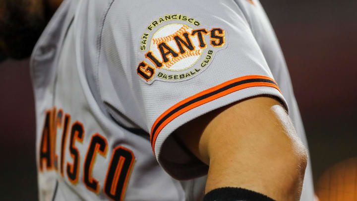 Jul 18, 2023; Cincinnati, Ohio, USA; The San Francisco Giants logo on the sleeve of right fielder Michael Conforto (8) during the fifth inning against the Cincinnati Reds at Great American Ball Park. 