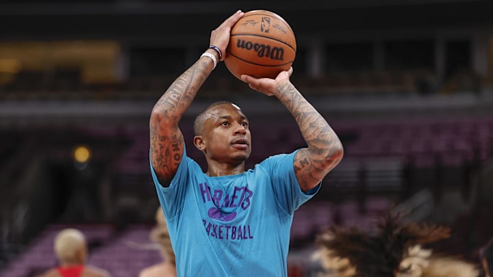 Apr 8, 2022; Chicago, Illinois, USA; Charlotte Hornets guard Isaiah Thomas (4) warms up before an NBA game against the Chicago Bulls at United Center. Mandatory Credit: Kamil Krzaczynski-Imagn Images