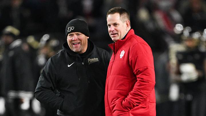 Nov 28, 2025; West Lafayette, Indiana, USA;  Purdue Boilermakers head coach Barry Odom and Indiana Hoosiers head coach Curt Cignetti speak before the game at Ross-Ade Stadium. Mandatory Credit: Marc Lebryk-Imagn Images