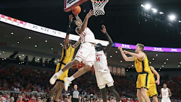 Nov 12, 2025; Houston, Texas, USA; Houston Cougars guard Ramon Walker Jr. (3) attempts to get control of the ball away from Oakland Golden Grizzlies guard Ziare Wells (2) during the first half at Fertitta Center. Mandatory Credit: Troy Taormina-Imagn Images