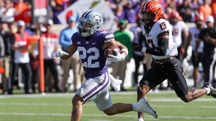 Oct 29, 2022; Manhattan, Kansas, USA; Kansas State Wildcats running back Deuce Vaughn (22) runs away