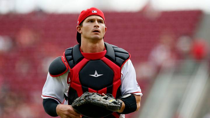 Cincinnati Reds catcher Mark Kolozsvary (47) circles back to the plate after catching a pop up.