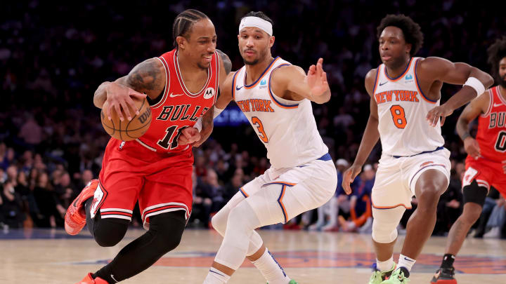 Jan 3, 2024; New York, New York, USA; Chicago Bulls forward DeMar DeRozan (11) drives to the basket against New York Knicks guard Josh Hart (3) and forward OG Anunoby (8) during the fourth quarter at Madison Square Garden. Mandatory Credit: Brad Penner-USA TODAY Sports