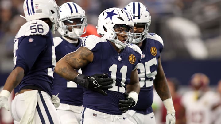 Dallas Cowboys linebacker Micah Parsons celebrates a sack of Washington Commanders quarterback Sam Howell.