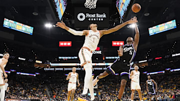 Nov 17, 2023; San Antonio, Texas, USA; Sacramento Kings guard De'Aaron Fox (5) shoots over San Antonio Spurs forward Victor Wembanyama (1) during the second half at Frost Bank Center. Mandatory Credit: Scott Wachter-Imagn Images