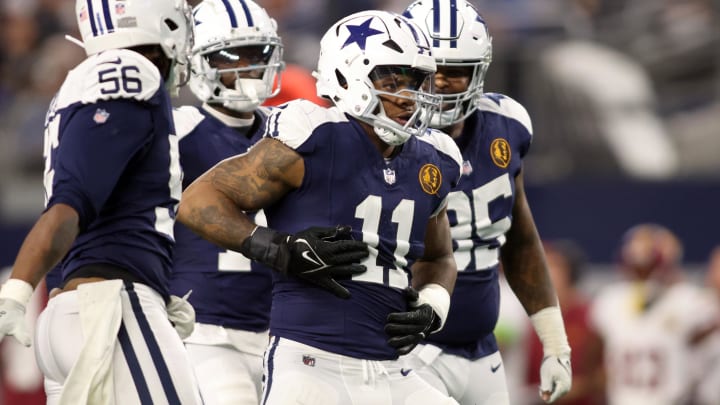 Nov 23, 2023; Arlington, Texas, USA; Dallas Cowboys linebacker Micah Parsons (11) celebrates a sack of Washington Commanders quarterback Sam Howell (not pictured) in the fourth quarter at AT&T Stadium. Mandatory Credit: Tim Heitman-USA TODAY Sports