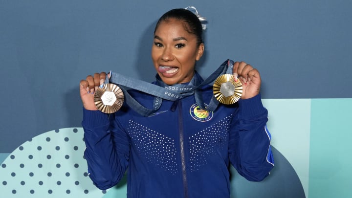 Aug 5, 2024; Paris, France; Jordan Chiles of the United States poses for a photo with her gold and bronze medasl after day three of the gymnastics event finals during the Paris 2024 Olympic Summer Games. Mandatory Credit: Kyle Terada-USA TODAY Sports