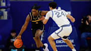 San Jose State Spartans guard Latrell Davis (5) dribbles the ball up court against Air Force Falcons guard Jeffrey Mills (24). 