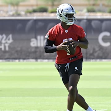 Jun 11, 2025; Henderson, NV, USA; Las Vegas Raiders quarterback Geno Smith (7) runs through a drill during Las Vegas Raiders Minicamp at Intermountain Health Performance Center. Mandatory Credit: Candice Ward-Imagn Images