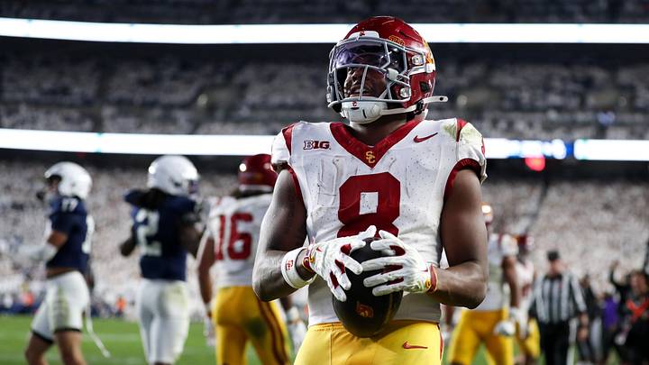 Oct 10, 2026; University Park, Pennsylvania, USA;  Southern California Trojans running back King Miller (8) runs the ball into the end zone for a touchdown during the third quarter against the Penn State Nittany Lions at West Shore Home Field at Beaver Stadium.  Mandatory Credit: Matthew O'Haren-Imagn Images
