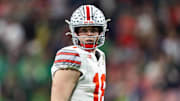 Jan 20, 2025; Atlanta, GA, USA; Ohio State Buckeyes quarterback Will Howard (18) against the Notre Dame Fighting Irish during the CFP National Championship college football game at Mercedes-Benz Stadium. Mandatory Credit: Mark J. Rebilas-Imagn Images