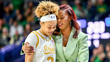 Feb 17, 2025; South Bend, Indiana, USA; Notre Dame Fighting Irish head coach Niele Ivey talks to guard Hannah Hidalgo (3) in the second half against the Duke Blue Devils at the Purcell Pavilion. Mandatory Credit: Matt Cashore-Imagn Images