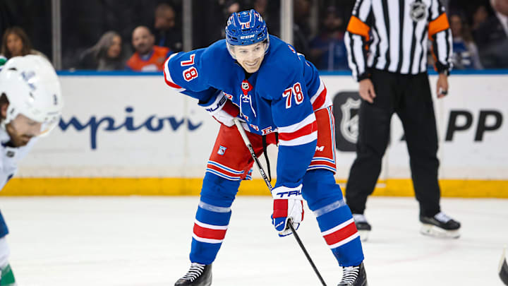 Mar 22, 2025; New York, New York, USA; New York Rangers left wing Brennan Othmann (78) smiles before a face-off against the Vancouver Canucks during the second period at Madison Square Garden. Mandatory Credit: Danny Wild-Imagn Images