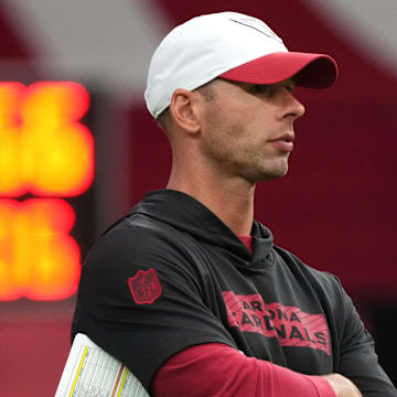 Arizona Cardinals head coach Jonathan Gannon watches his team from the sidelines during training camp at State Farm Stadium in Glendale on July 25, 2024.