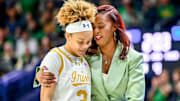 Feb 17, 2025; South Bend, Indiana, USA; Notre Dame Fighting Irish head coach Niele Ivey talks to guard Hannah Hidalgo (3) in the second half against the Duke Blue Devils at the Purcell Pavilion. 