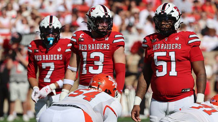 Sep 26, 2026; Lubbock, Texas, USA;  Texas Tech Red Raiders defesnive linebacker Ben Roberts (13) and  defensive nose guard Jayden Cofield (51) wait to rush against Sam Houston Bearkat offensive lineman Brock Stukes (54) in the first half at Galaxy Stadium. Mandatory Credit: Michael C. Johnson-Imagn Images