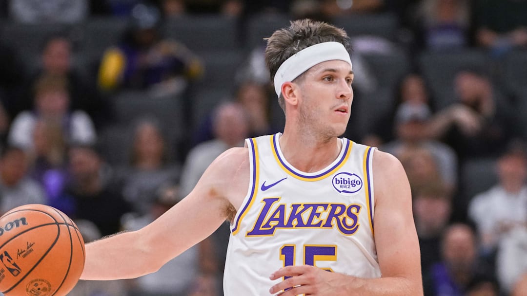 Oct 26, 2025; Sacramento, California, USA; Los Angeles Lakers guard Austin Reaves (15) controls the ball against the Sacramento Kings during the second quarter at Golden 1 Center.