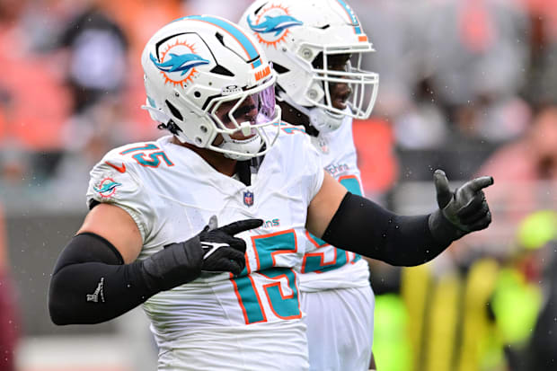 Miami Dolphins linebacker Jaelan Phillips (15) celebrates after a tackle during the first half against the Cleveland Browns.