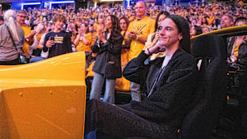 Indiana Fever Guard Caitlin Clark at the NBA playoffs between the Indiana Pacers and the Milwaukee Bucks.