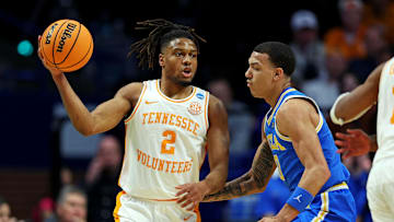 Mar 22, 2025; Lexington, KY, USA; Tennessee Volunteers guard Chaz Lanier (2) handles the ball against UCLA Bruins guard Kobe Johnson (0) during the first half in the second round of the NCAA Tournament at Rupp Arena. Mandatory Credit: Jordan Prather-Imagn Images