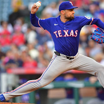 Jul 30, 2025; Anaheim, California, USA; Texas Rangers pitcher Nathan Eovaldi (17) throws against the Los Angeles Angels during the first inning at Angel Stadium. 