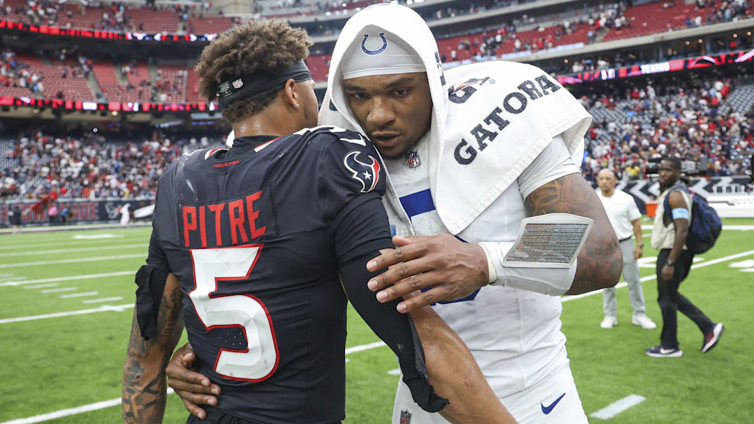 Oct 27, 2024; Houston, Texas, USA; Indianapolis Colts quarterback Anthony Richardson (5) greets Houston Texans safety Jalen Pitre (5) on the field after the game at NRG Stadium. Mandatory Credit: Troy Taormina-Imagn Images Oct 27, 2024; Houston, Texas, USA; Indianapolis Colts quarterback Anthony Richardson (5) greets Houston Texans safety Jalen Pitre (5) on the field after the game at NRG Stadium. Mandatory Credit: Troy Taormina-Imagn Images